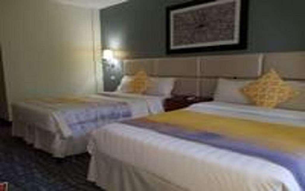 Century Hotel Garapan Phòng bức ảnh